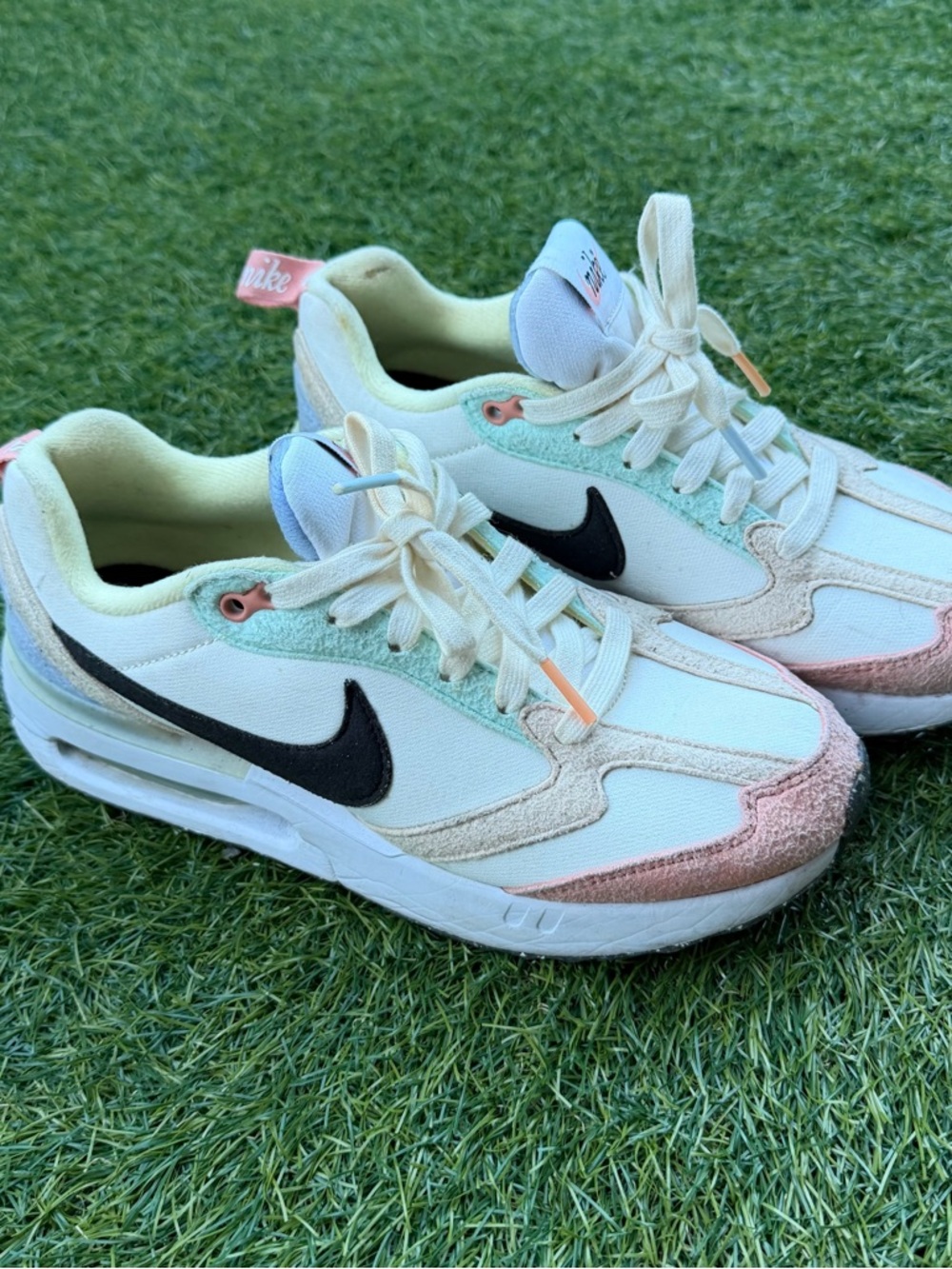 Nike White Sneakers with Black Swoosh and Mint & Pink Accents